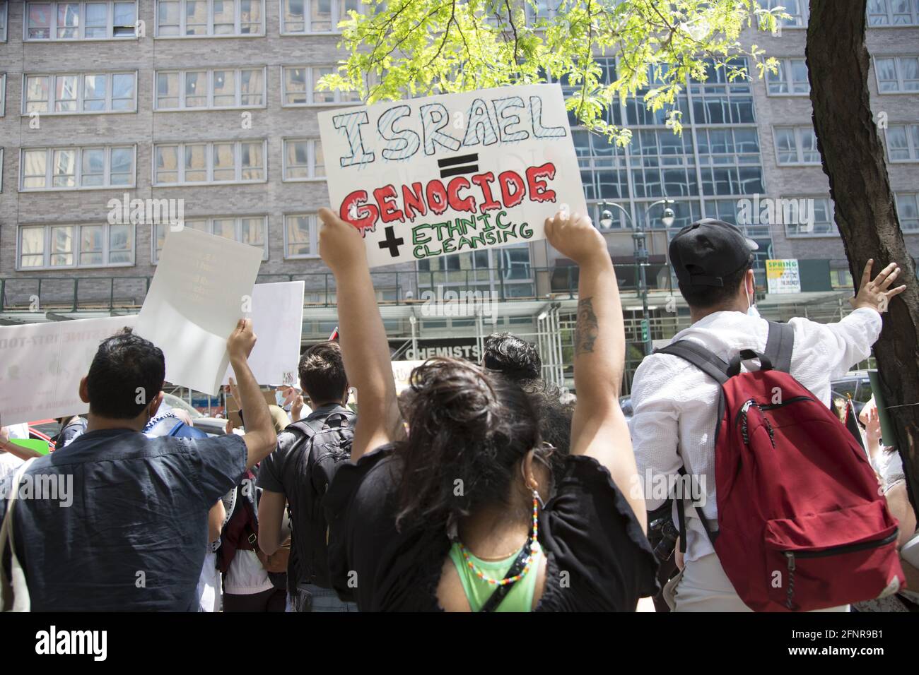 Palestinian & pro-Palestinian demonstrators have come out in force at the Israeli Consulate on 2nd Avenue in New York City to protest the Israeli bombings of Gaza during the latest Israeli/Palestinian firestorm where hundreds of civilians including many children have been killed. Stock Photo