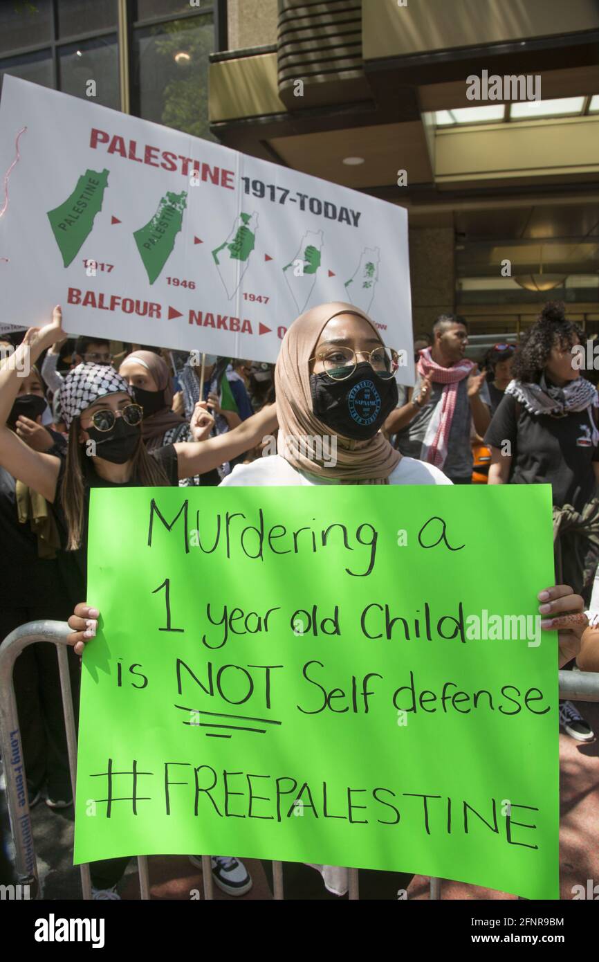 Palestinian & pro-Palestinian demonstrators have come out in force at the Israeli Consulate on 2nd Avenue in New York City to protest the Israeli bombings of Gaza during the latest Israeli/Palestinian firestorm where hundreds of civilians including many children have been killed. Stock Photo