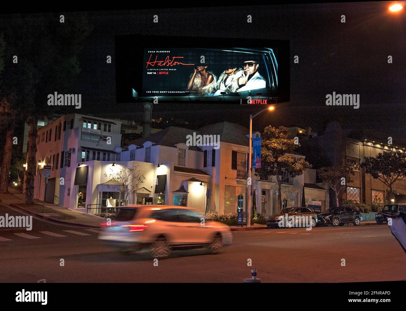 A Netflix billboard promotes its programming titled Halston on a digital billboard on the Sunset Strip in Los Angeles, CA Stock Photo