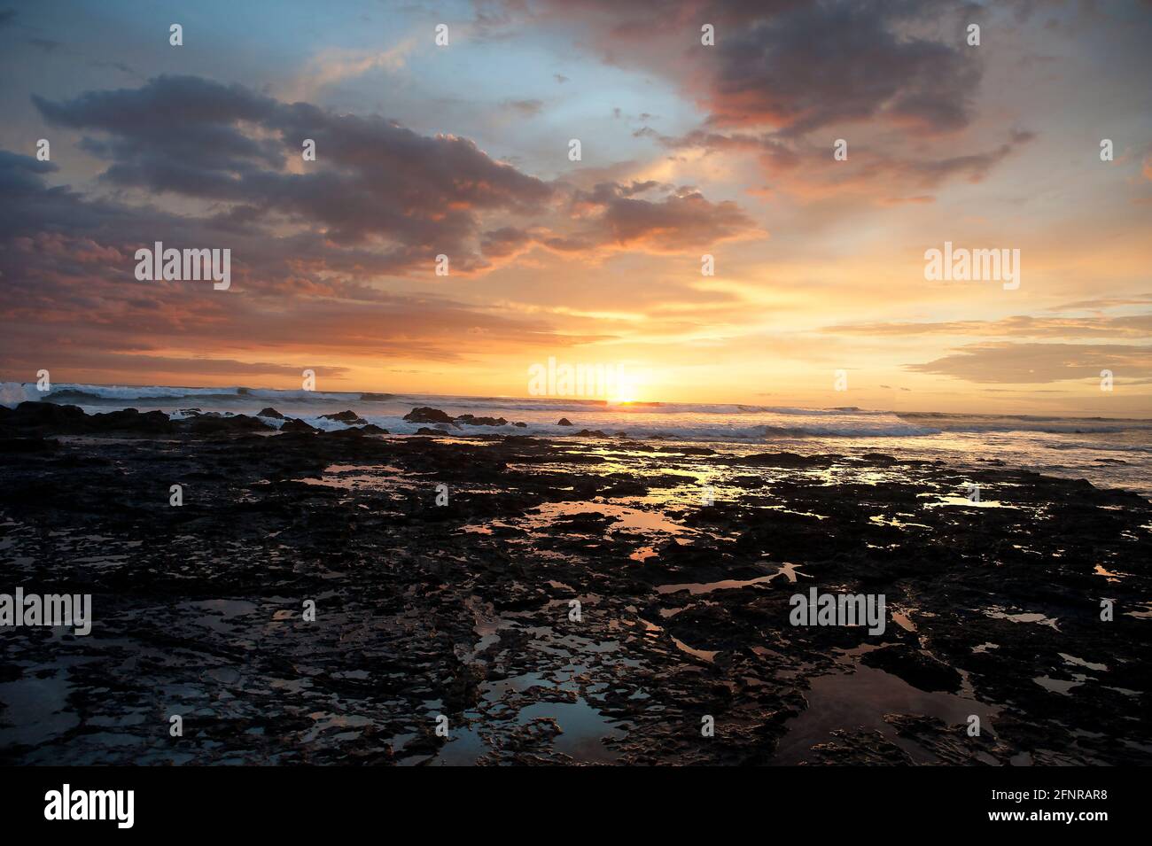 Tidepools in rocks at beach in Tamarindo, Cosa Rica Stock Photo