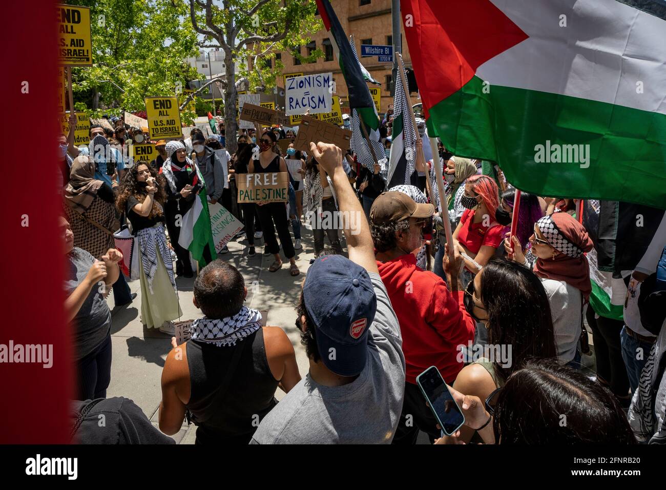 Los Angeles, California, USA. 18th May, 2021. Hundreds of people chant in front of the Consulate General of Israel in Los Angeles, CA on Tuesday, May 18, 2021 to protest in solidarity with Palestinians on strike in Israel, the West Bank, and the Gaza Strip. Credit: Justin L. Stewart/ZUMA Wire/Alamy Live News Stock Photo