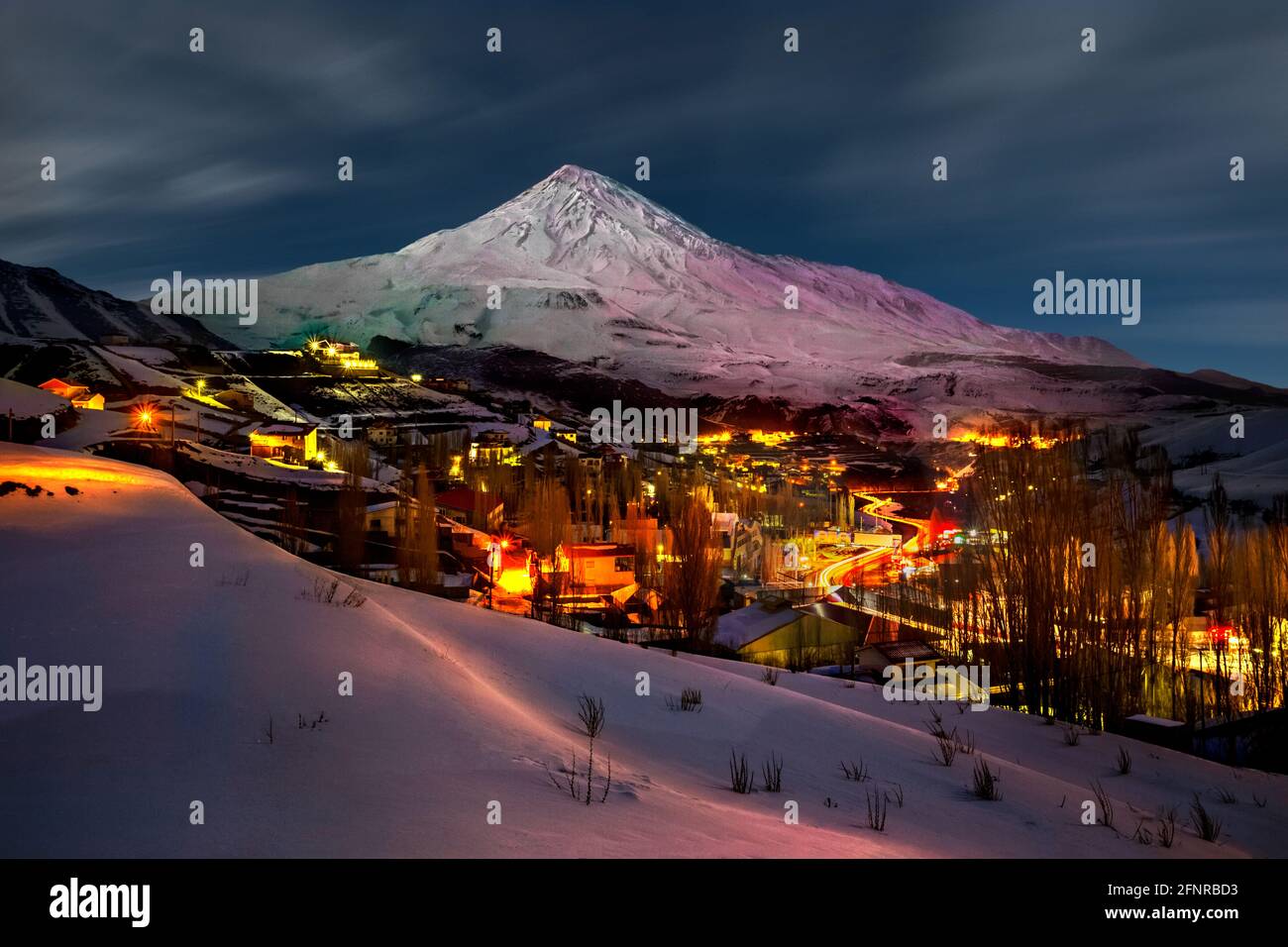The night view of Mount Damavand from polour in Mazandaran province of Iran. Mt Damavand is the highest peak in Iran and the highest volcano in Asia. Stock Photo