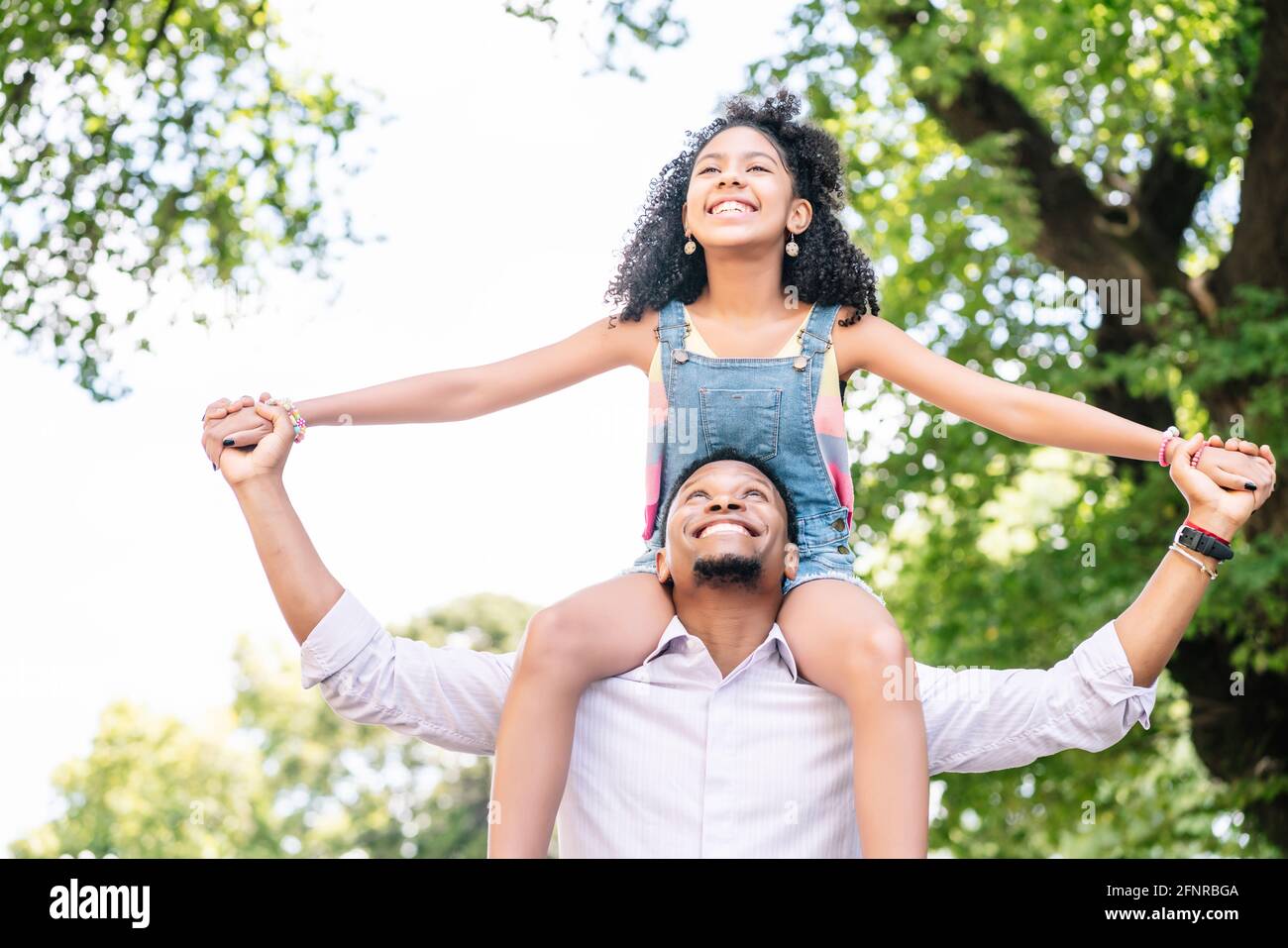 Father and daughter having fun together outdoors Stock Photo - Alamy