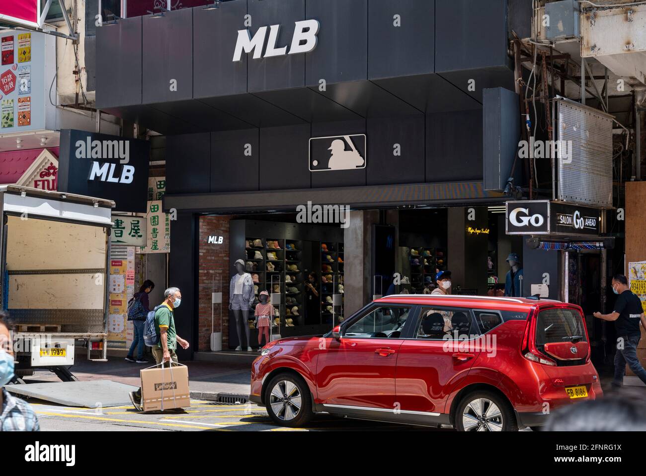 Pedestrians walk past the American professional baseball organization, Major  League Baseball (MLB),official store in Hong Kong. (Photo by Budrul Chukrut  / SOPA Images/Sipa USA Stock Photo - Alamy