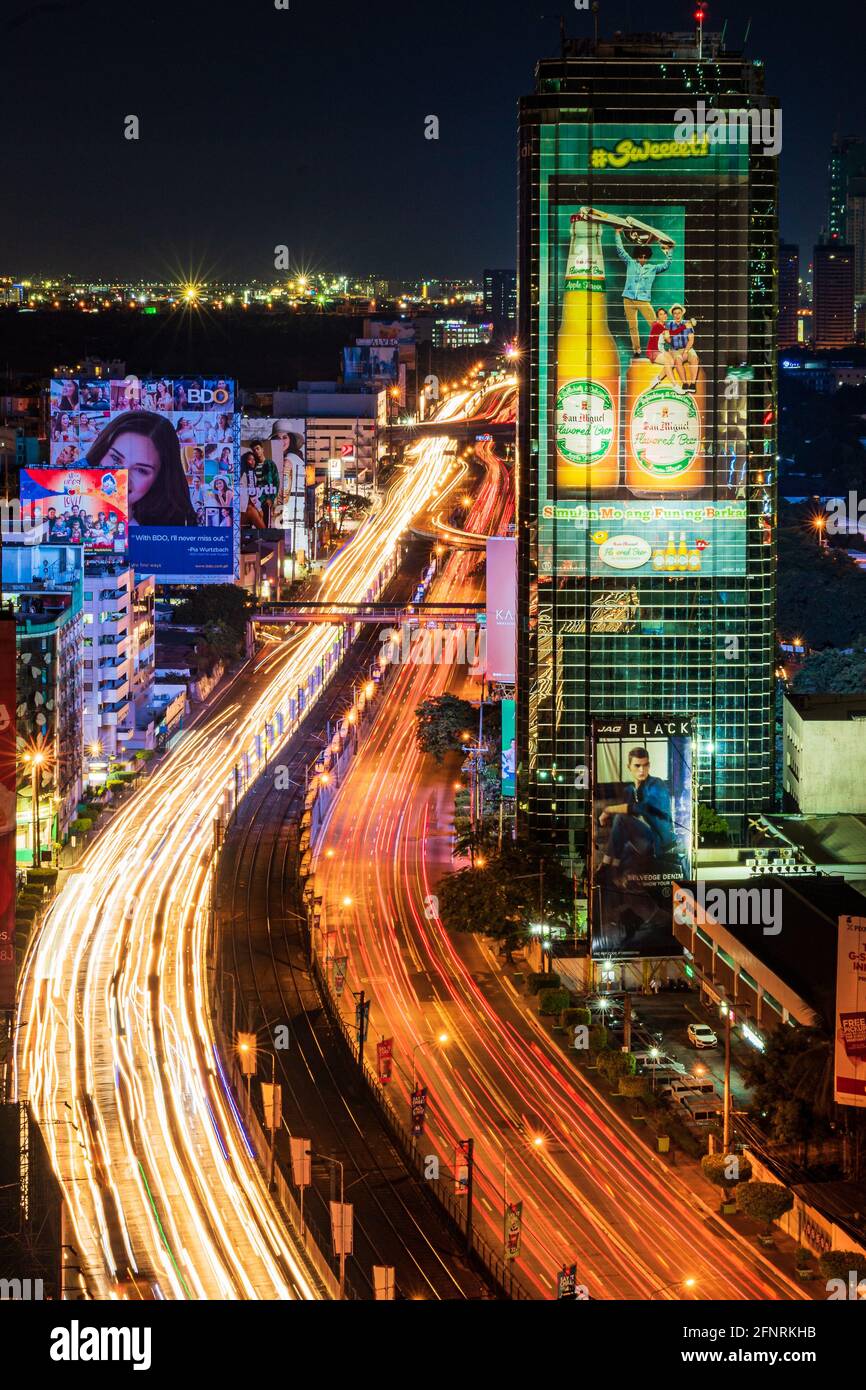 Nighttime Traffic on EDSA in Makati, Manila, Philippines Stock Photo
