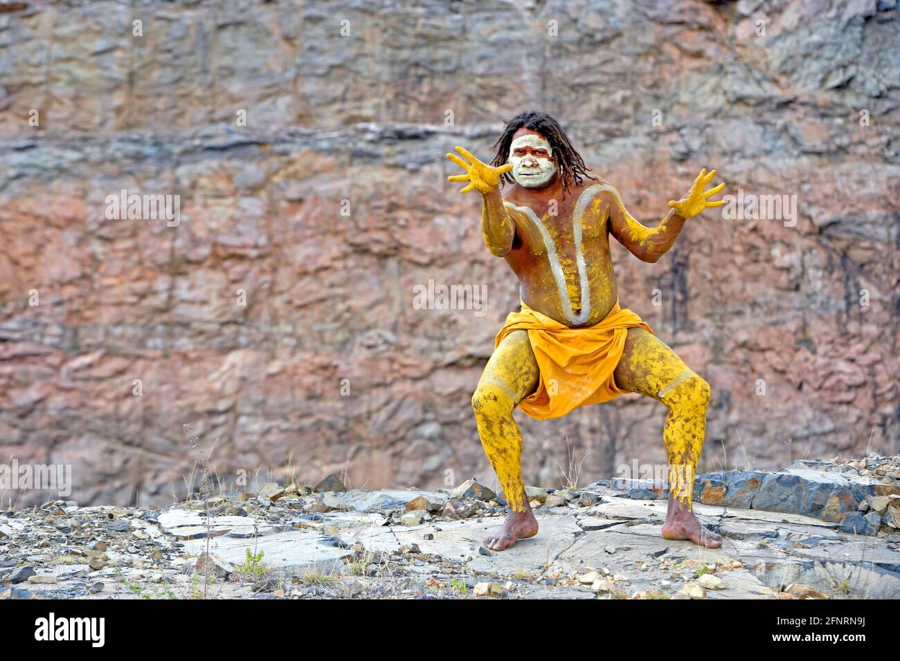 Turtle, male lead performer - Descendance Aboriginal Dance Group.  Thuringow River Festival. North Queensland. Australia. Model Release # 484 Stock Photo