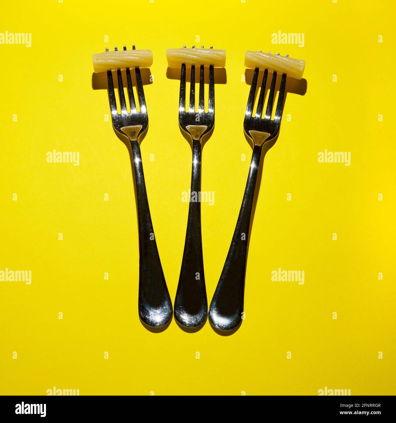 three forks with rigatoni pasta Stock Photo Alamy