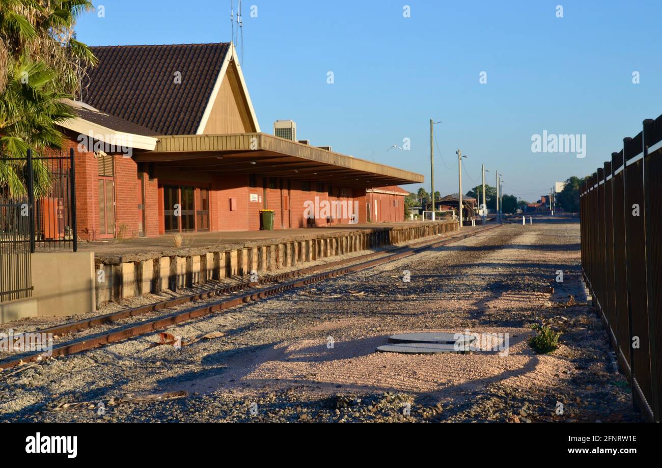 Deserted and derelict railway station and railroad tracks in outback town of Mildura on the Murray River Stock Photo