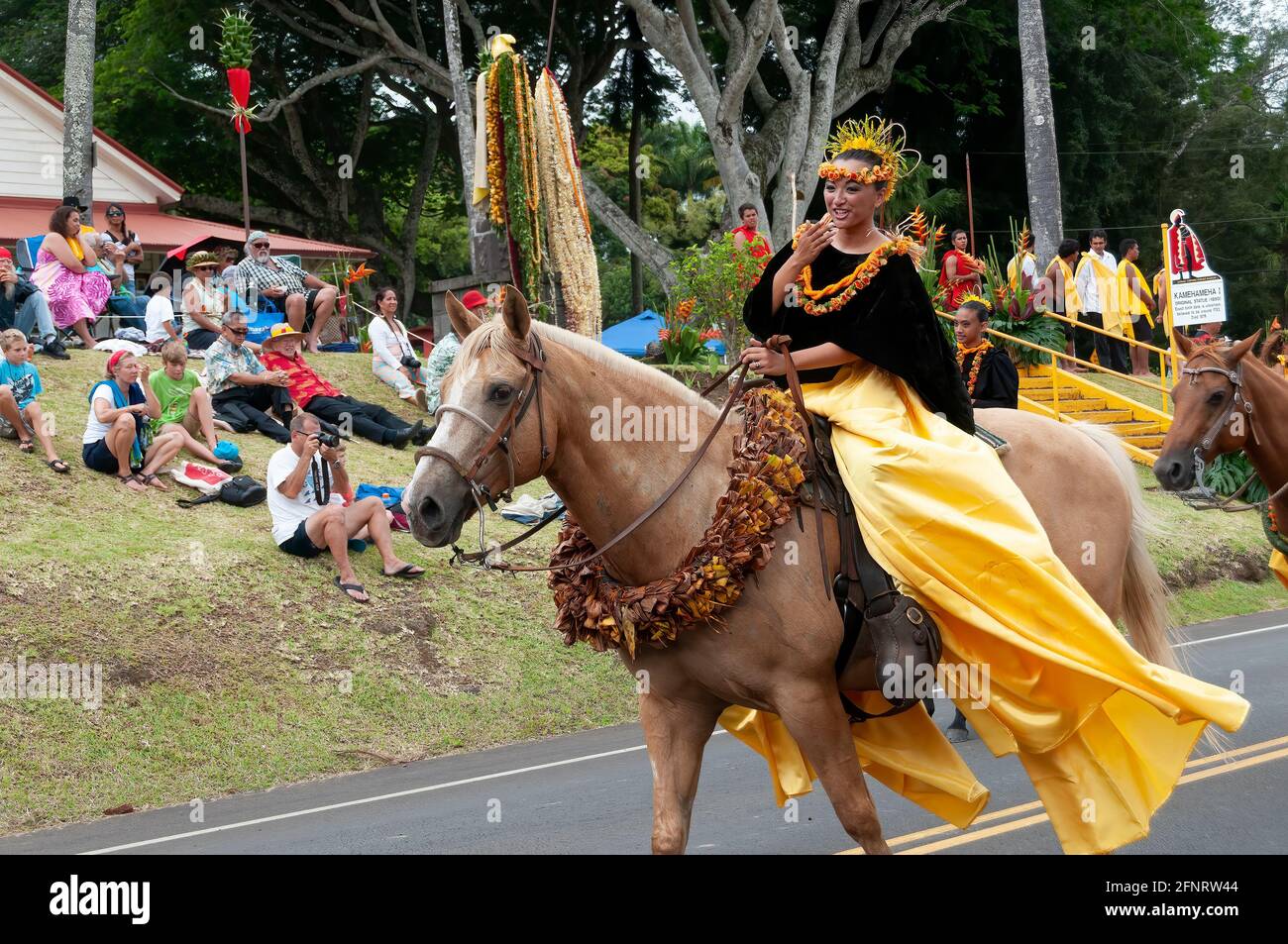 A Pa'u Princess Representing the Island of Oahu Rides in the King Kamehameha Day Parade in Kapa'au, North Kohala, Big Island, Hawaii. Stock Photo