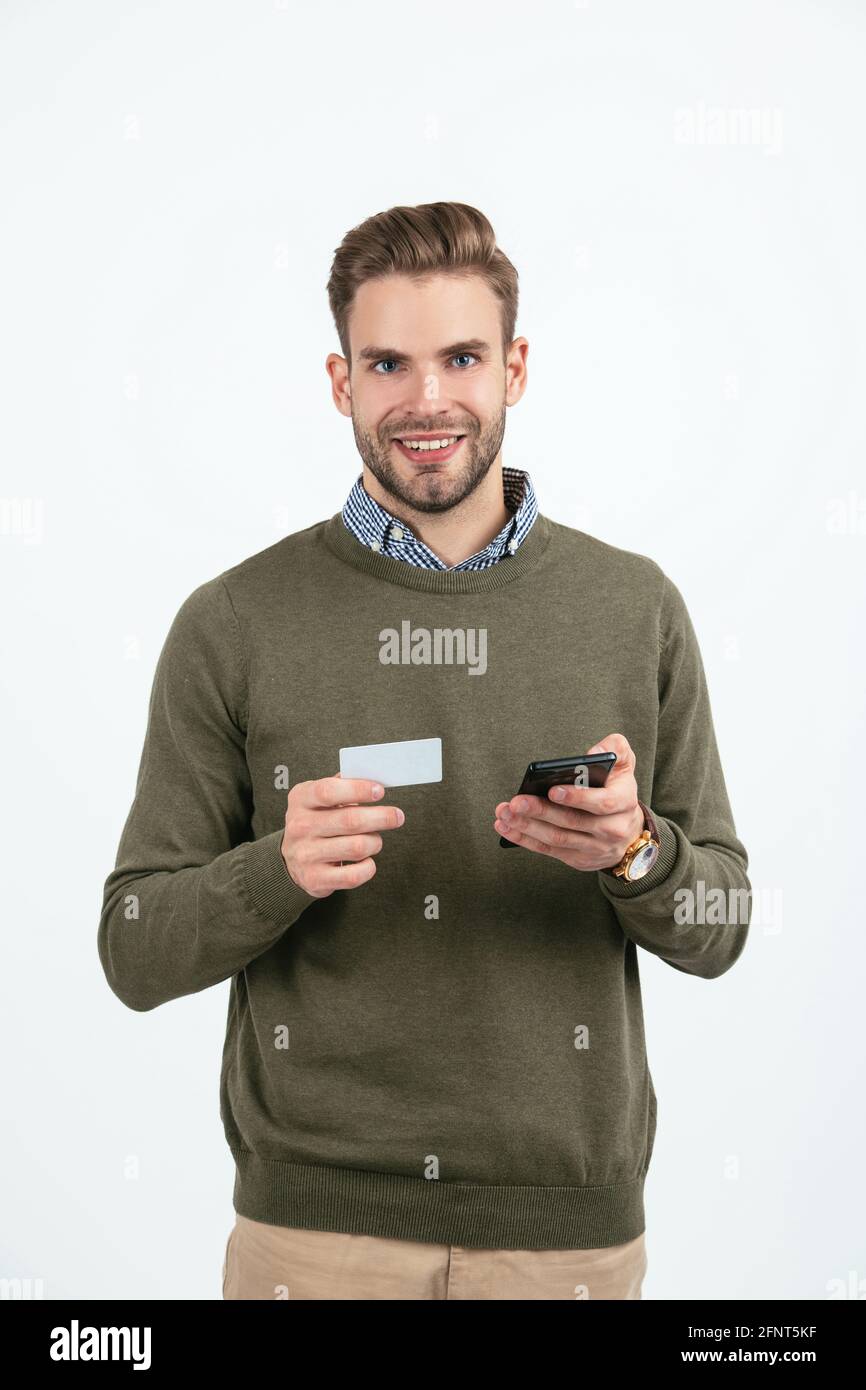 man businessman hold business card and smartphone for paying online isolated on white, cyber monday. Stock Photo