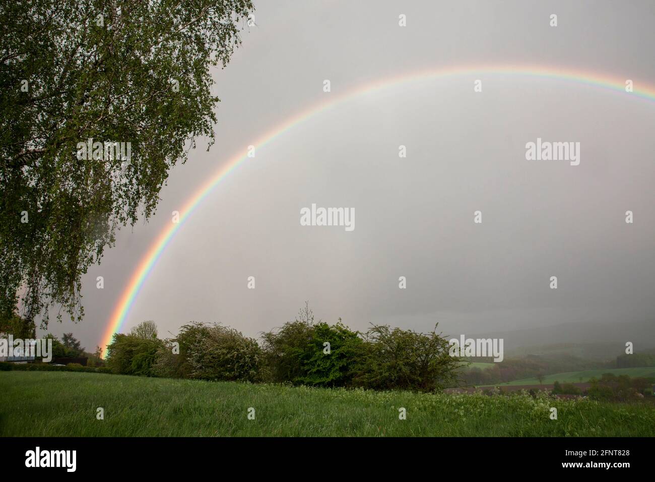 rainbow near Gevelsberg, North Rhine-Westphalia, Germany.  Regenbogen bei Gevelsberg, Nordrhein-Westfalen, Deutschland. Stock Photo