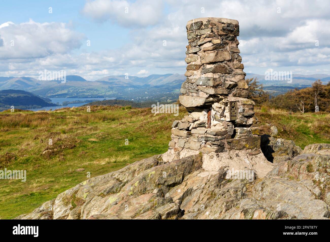 Cairn at Gummer's How above Lake Windermere in Cumbria, England. The landscape is part of the English Lake District. Stock Photo