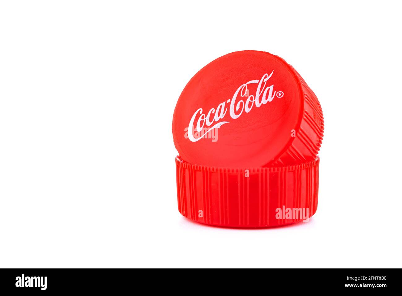 Kharkov, Ukraine - May 11, 2021: Coca-cola caps isolated on the white background Stock Photo