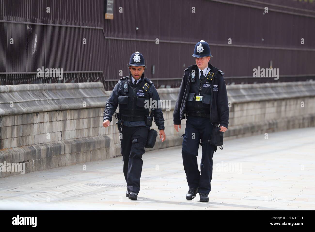 Two policemen on patrol in Westminster, London, UK Stock Photo