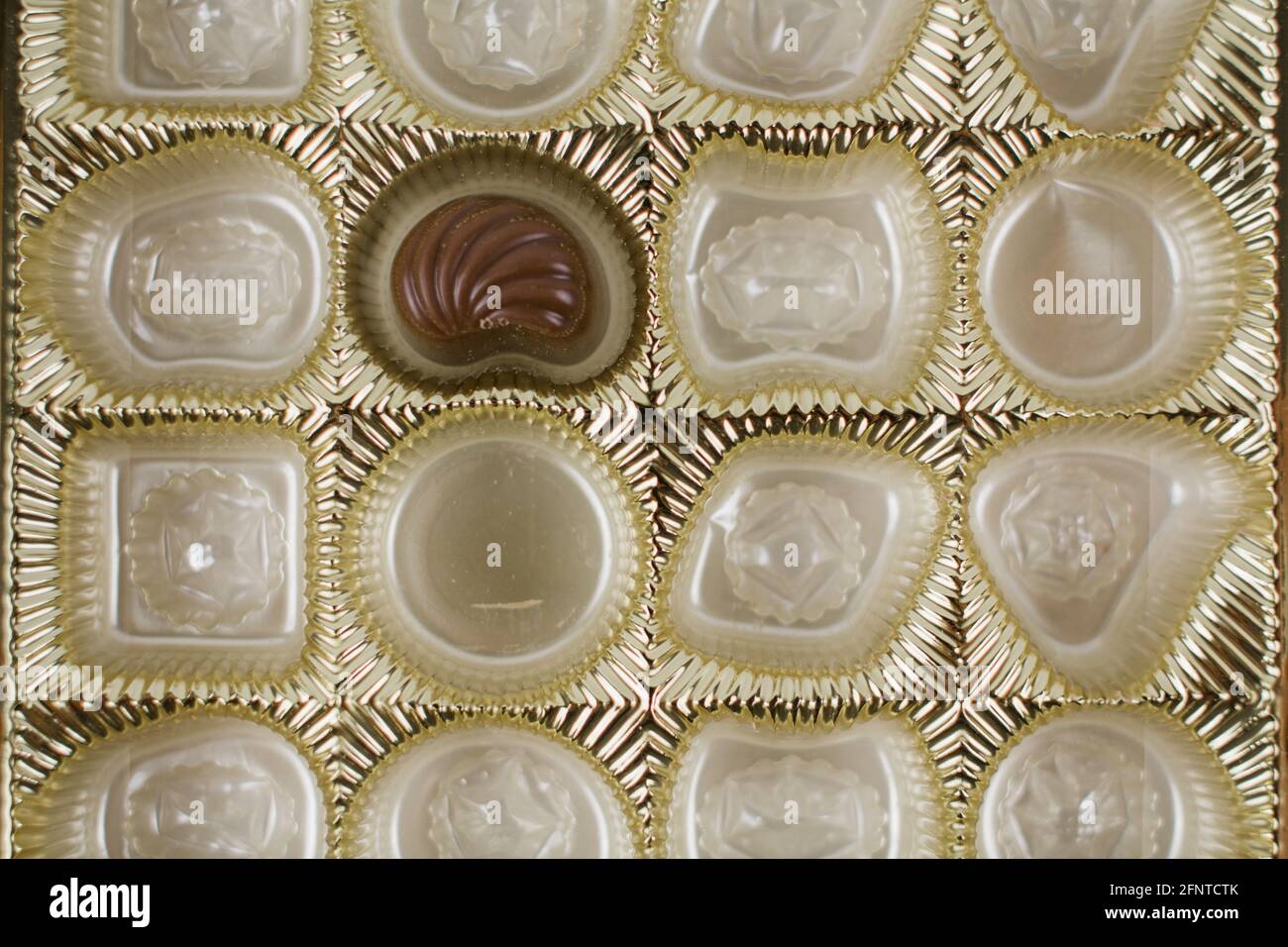 the last chocolates in a candy box Stock Photo Alamy