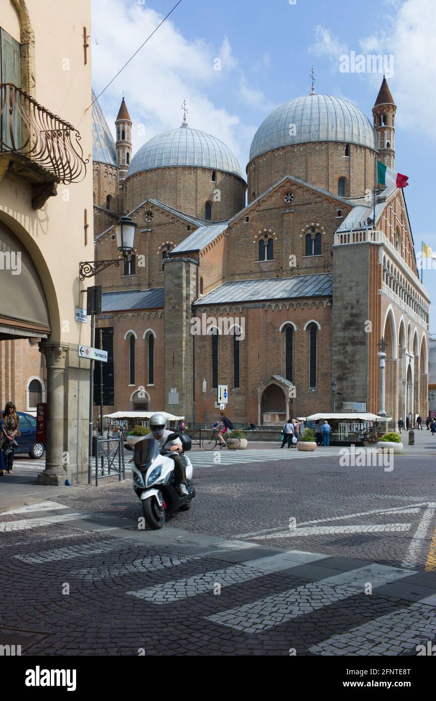 Basilica of Saint Anthony of Padua on June 12, 2012 in Padua, Italy. Famous are Giotto's frescoes in the Capella deli Scrovegni. Man on scooter Stock Photo