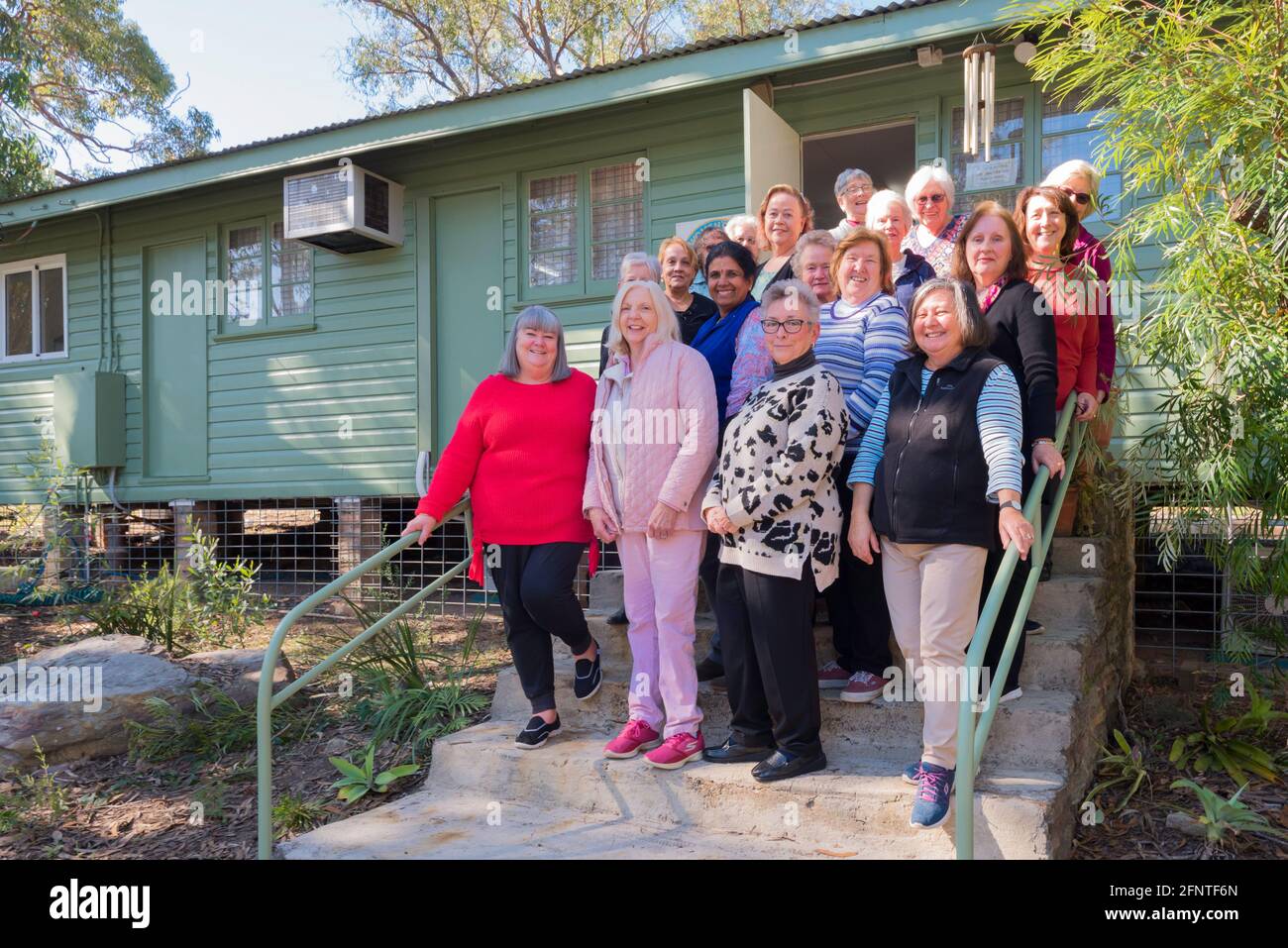 Ladies from the Country Womens Association (CWA) Castle Hill Branch in front of their newly painted hall in Kenthurst, New South Wales, Australia Stock Photo