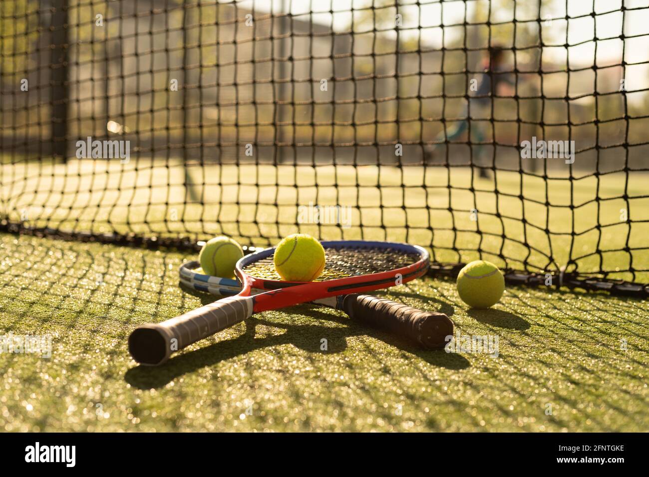 Tennis game. Tennis ball with racket on the tennis court. Sport