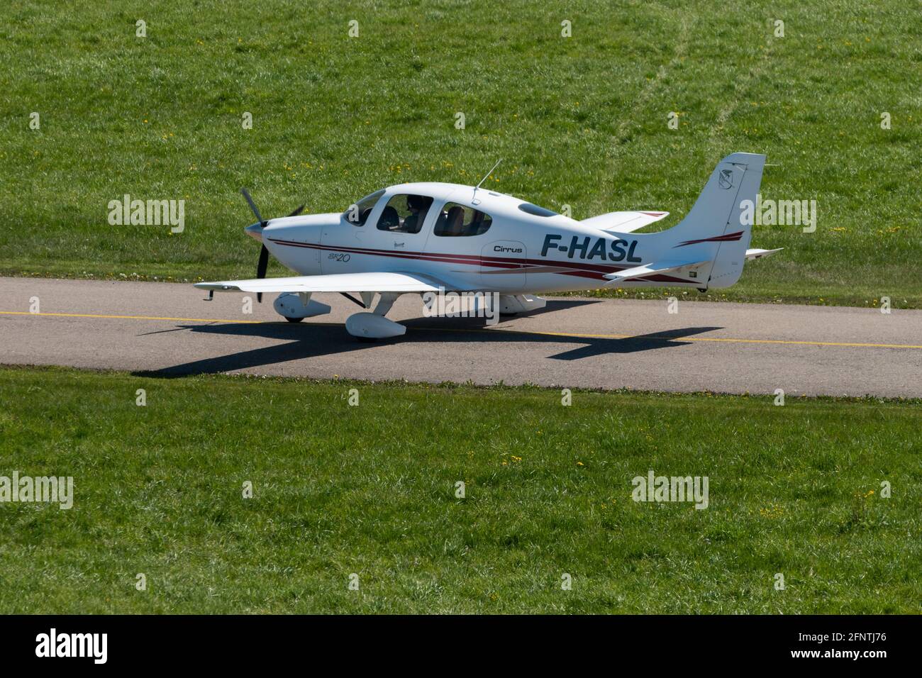 Cirrus SR 20 aircraft is taxiing at the airport Saint Gallen Altenrhein in  Switzerland 23.4.2021 Stock Photo - Alamy