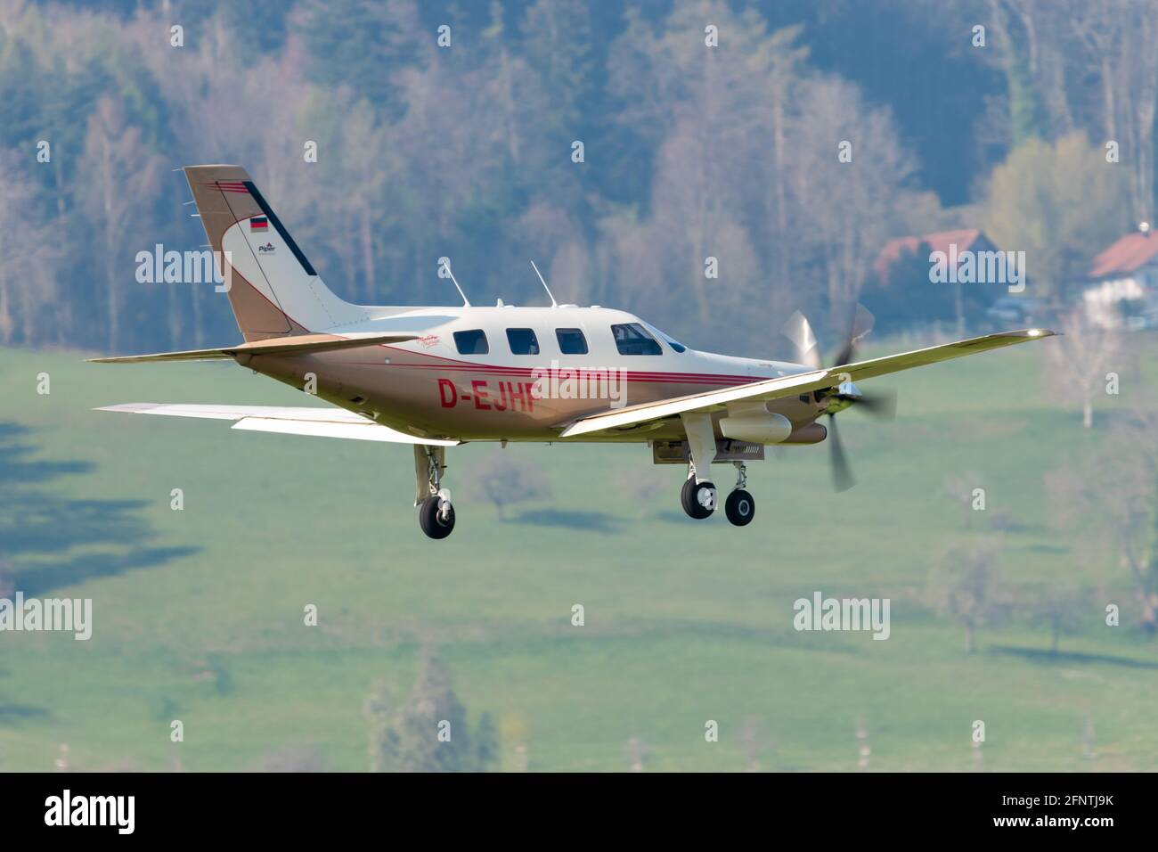 Piper PA-46 Malibu is approaching at the airport Saint Gallen Altenrhein in  Switzerland 21.4.2021 Stock Photo - Alamy