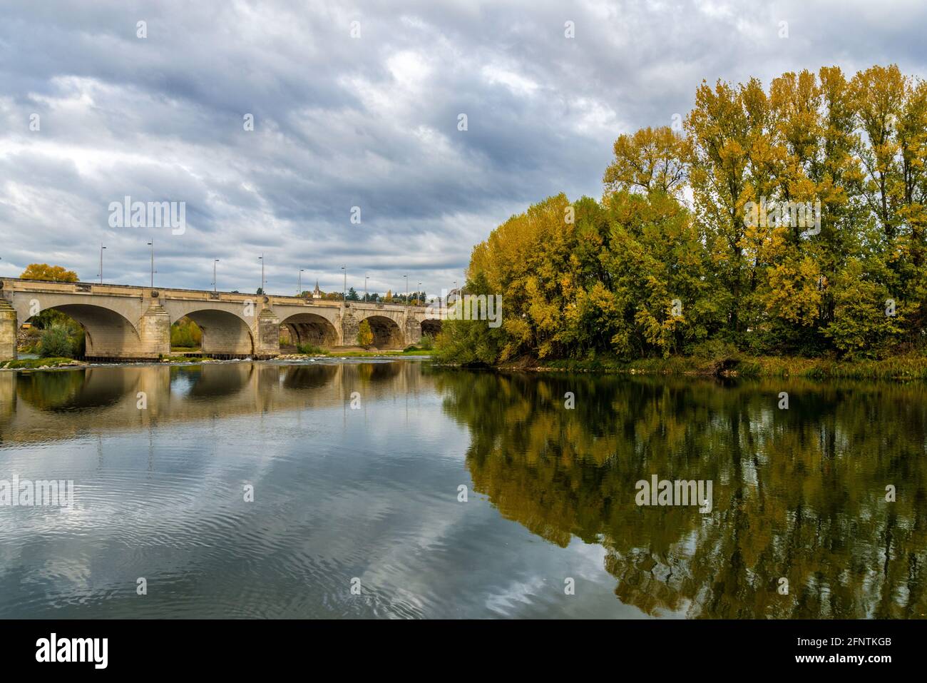 Old beautiful stone bridge Pont Wilson in Tours, France Stock Photo