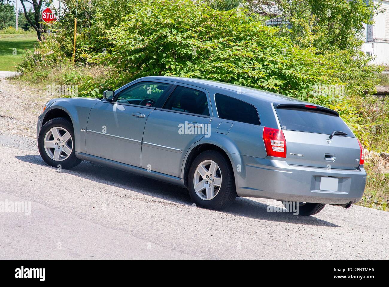 2005 Silver Dodge Magnum SXT Station Wagon In Canada Rear Angle View Stock Photo