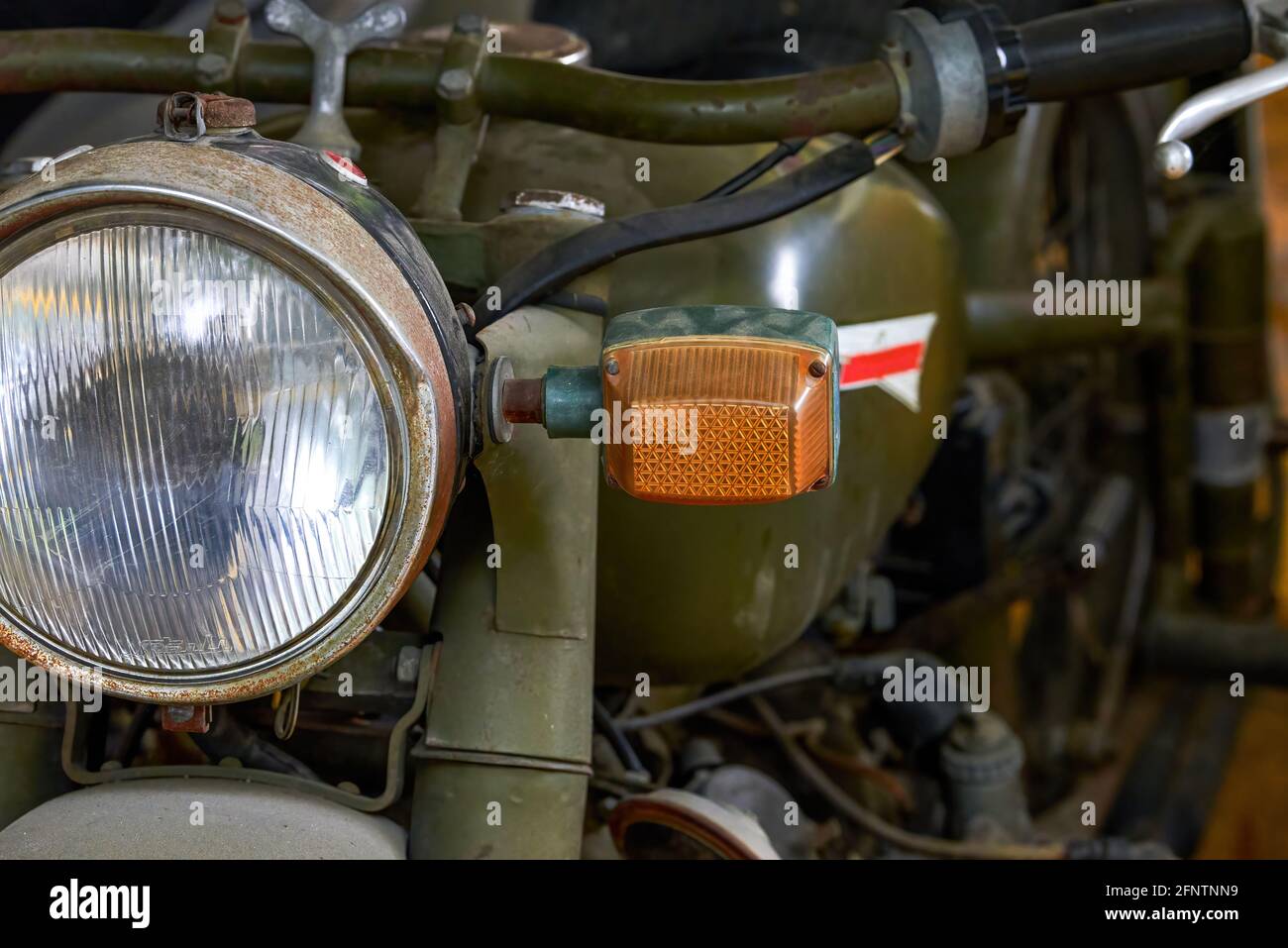A closeup of the head of an abandoned military tricycle Stock Photo