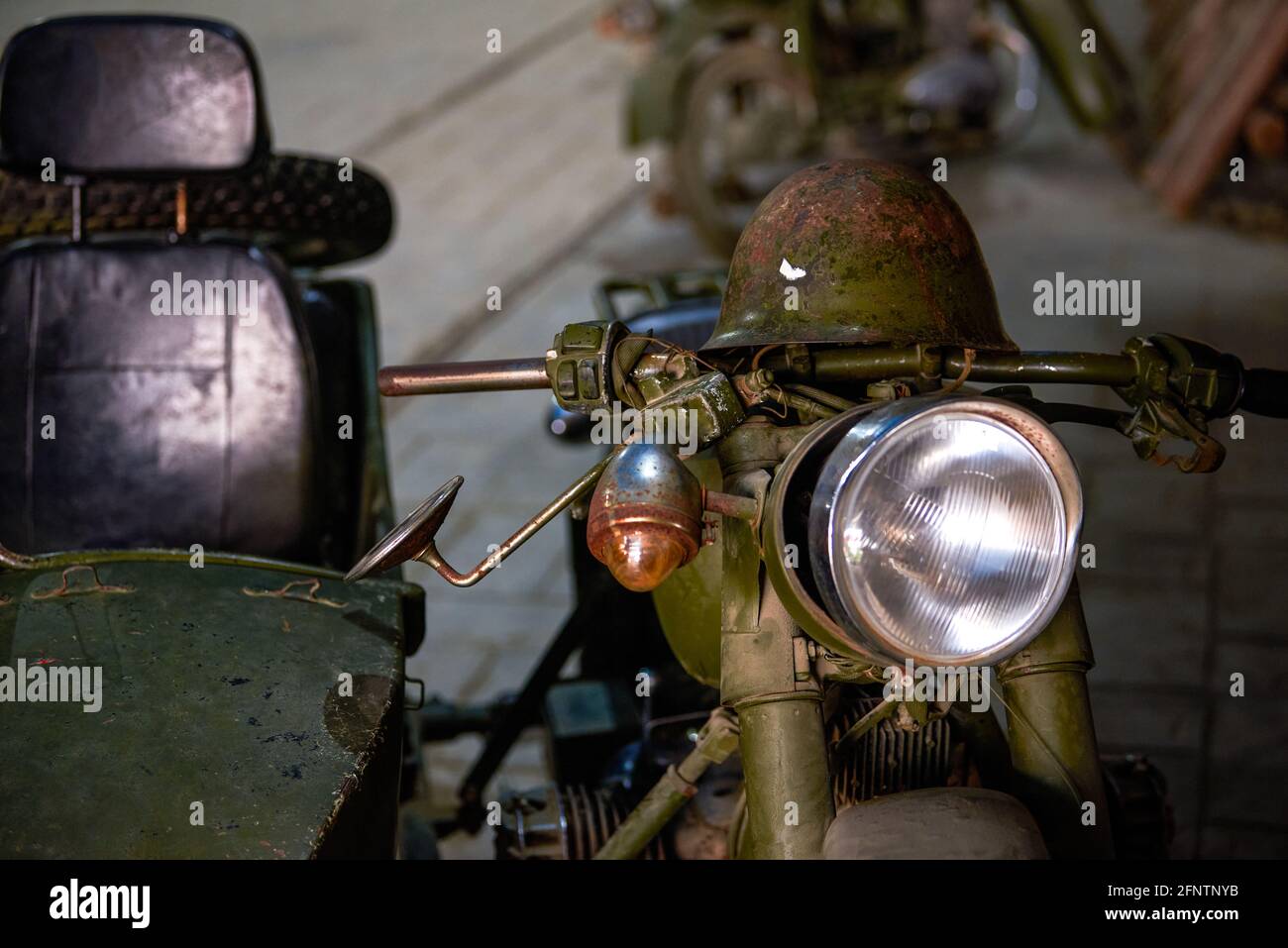 A closeup of the head of an abandoned military tricycle Stock Photo