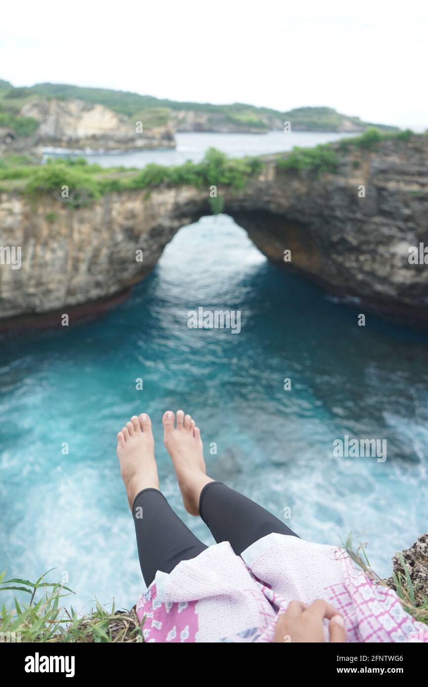 Sitting Relaxing view Broken Beach Bali Indonesia Stock Photo - Alamy