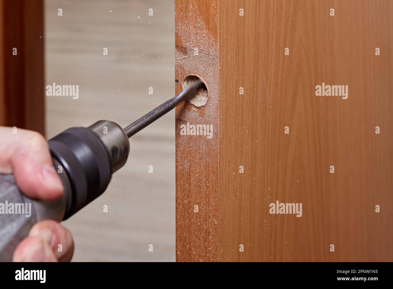 Drilling hole for Latch in wooden interior door with using flat bit