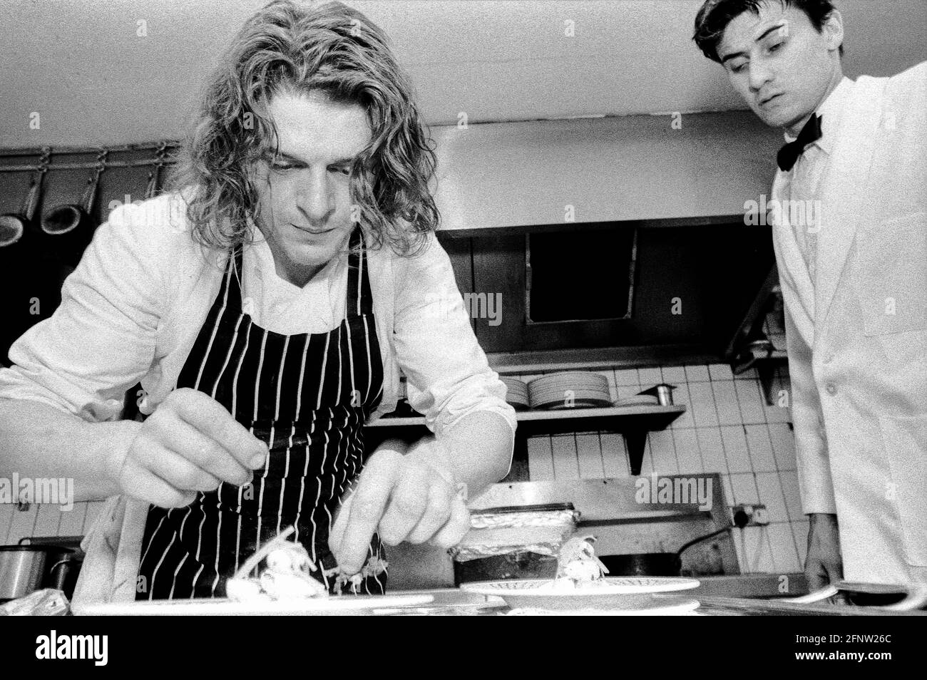 Celebrity chef Marco Pierre White in the kitchen of Harvey's restaurant in Wandsworth at the height of his growing fame. London, UK Stock Photo