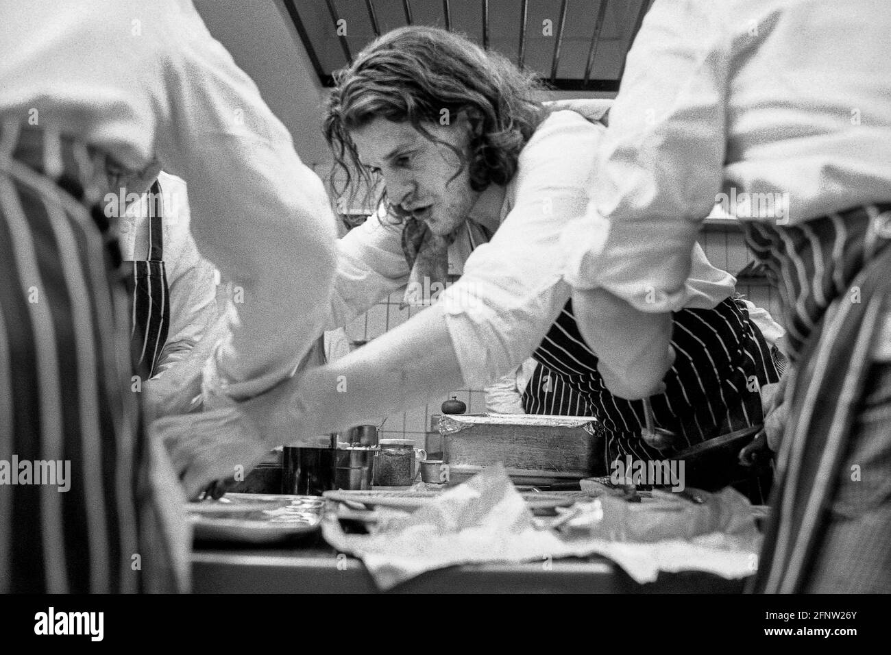 Celebrity chef Marco Pierre White in the kitchen of Harvey's restaurant in Wandsworth at the height of his growing fame. London - 1989, UK Stock Photo