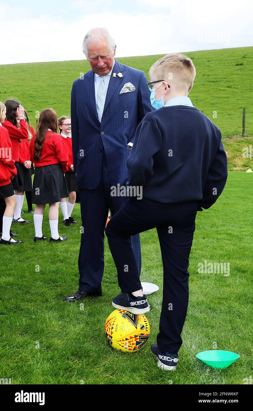 The Prince of Wales in conversation with local school children at ...