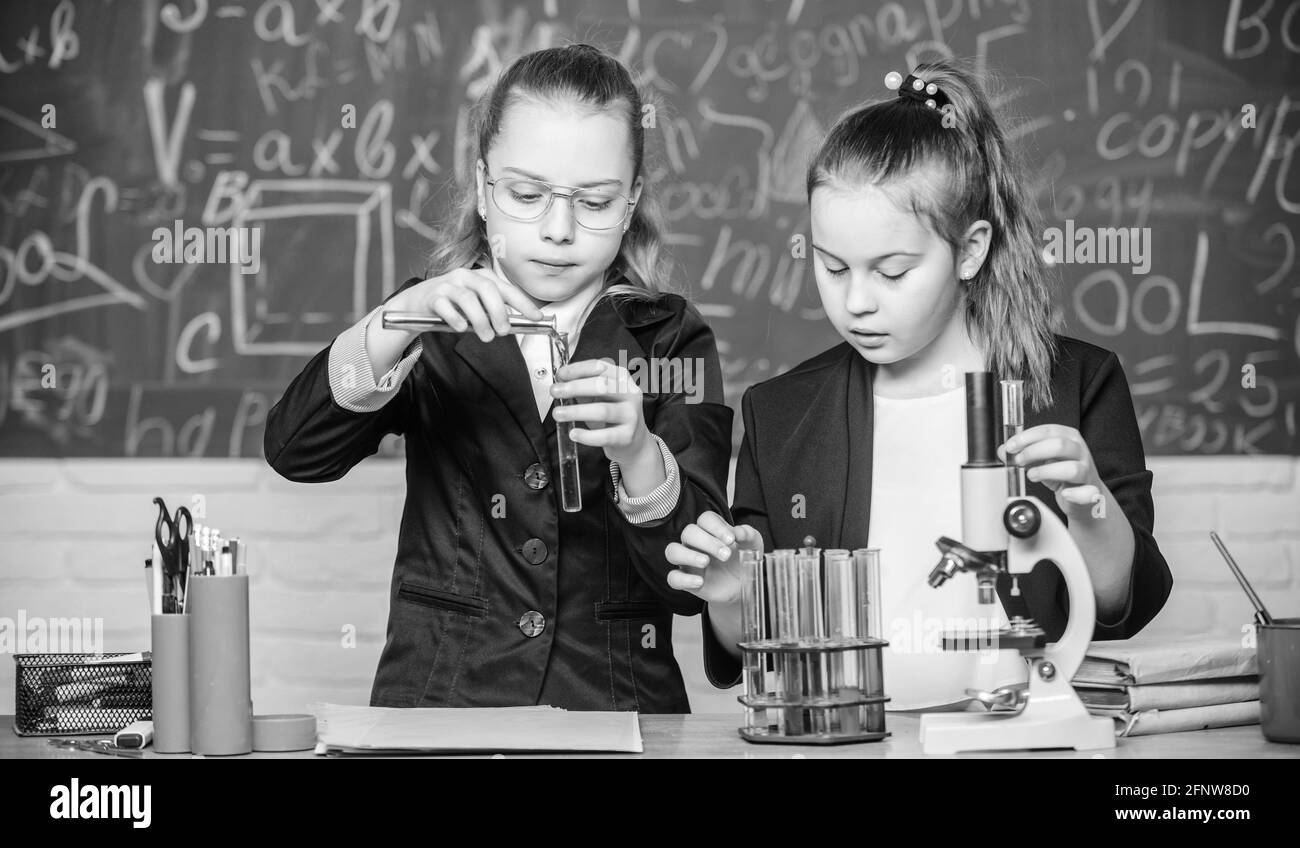 Private school. School project investigation. School experiment. Science concept. Gymnasium students with in depth study of natural sciences. Girls Stock Photo