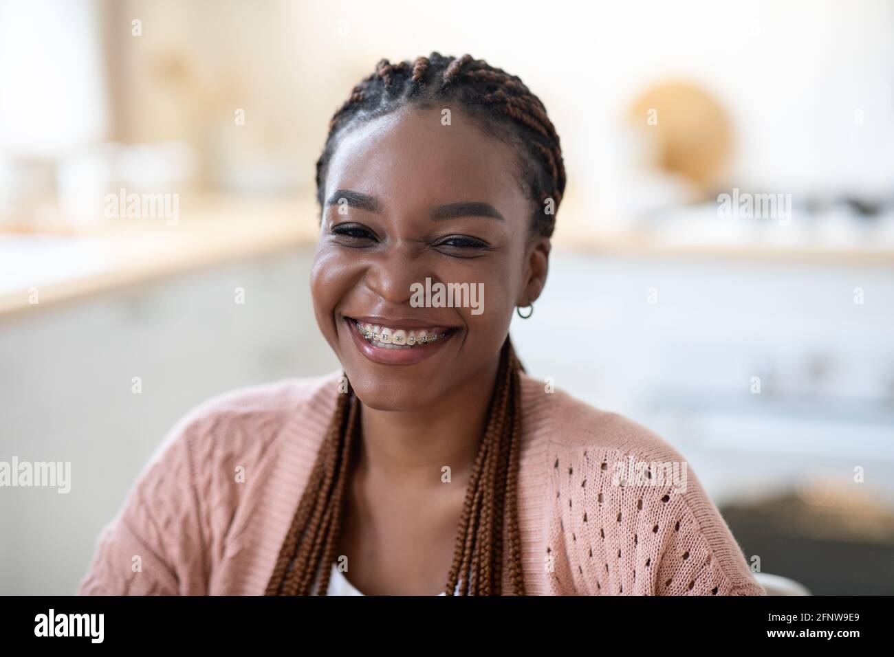 Black woman beautiful face sitting hi-res stock photography and images ...