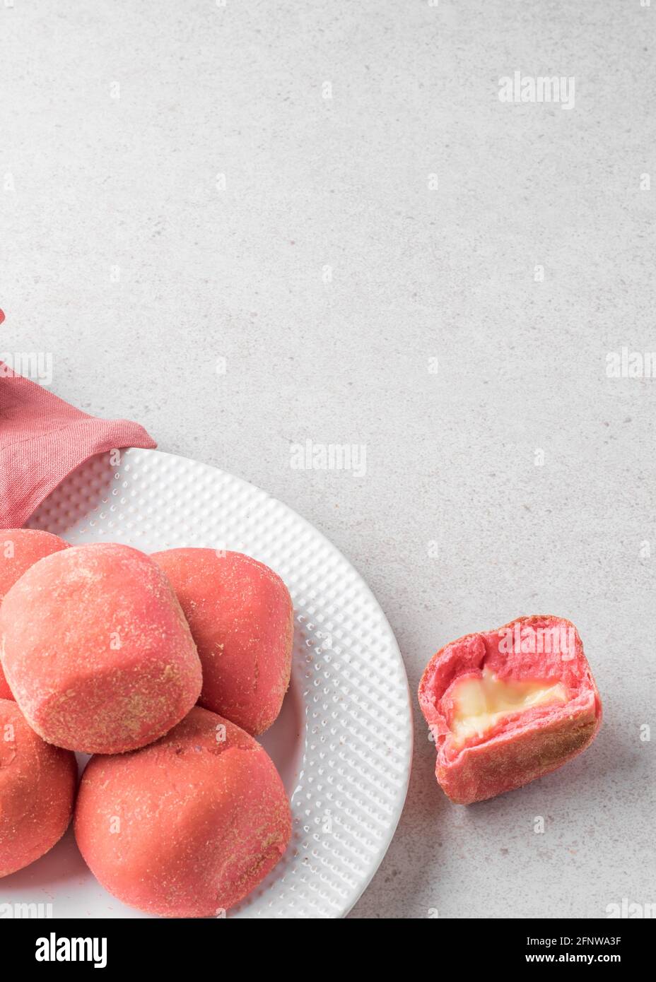 Pink strawberry bread pandesal with cheese filling Stock Photo