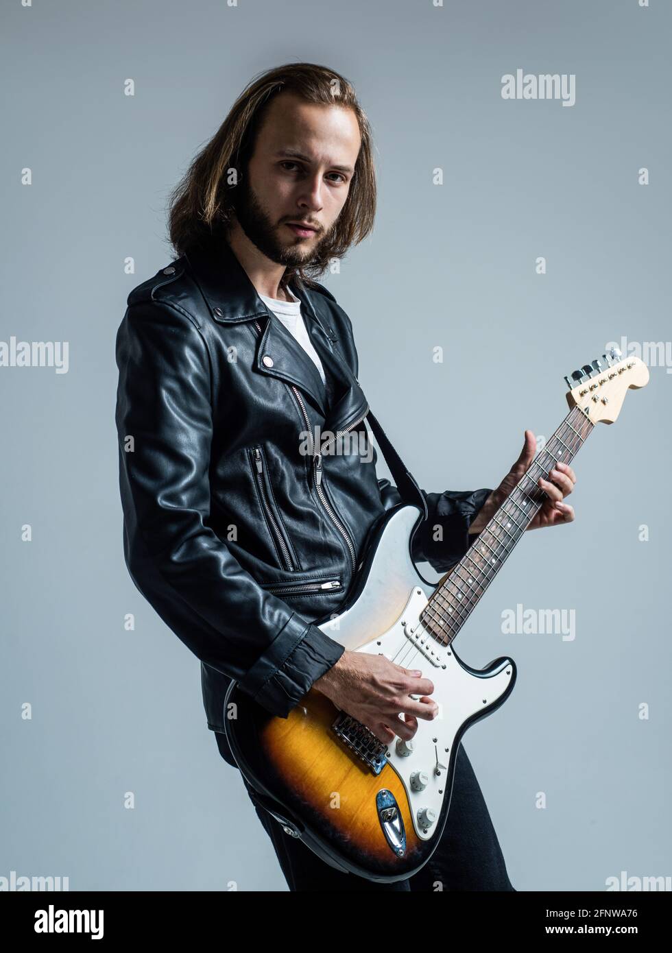 Guitar Rocker man long hair play electric guitar. rock music style. musician guitar ...