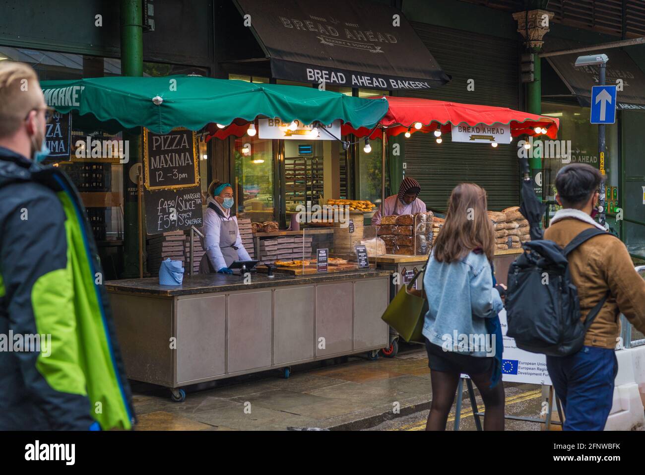 Bread Ahead Bakery outside food counter at Borough Market, London