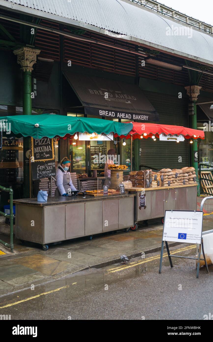 Bread Ahead Bakery outside food counter at Borough Market, London