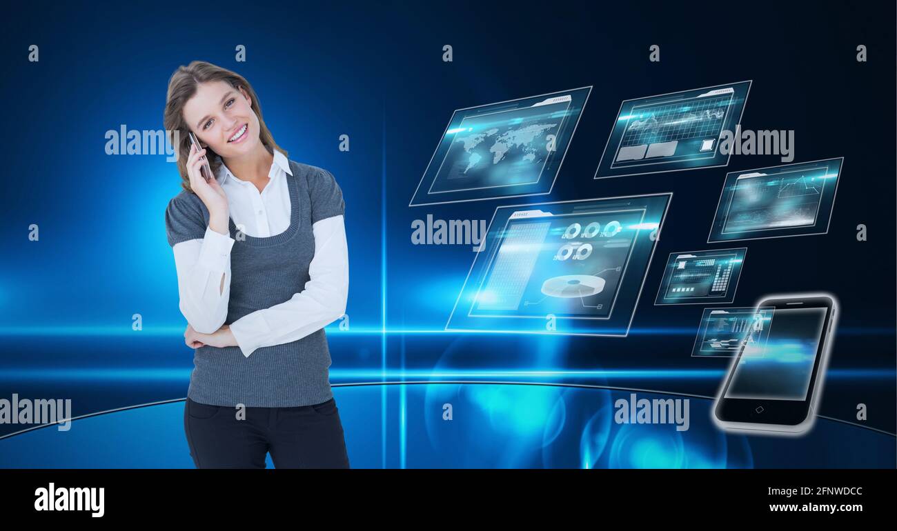 Composition of smiling businesswoman using smartphone over digital screens with data processing Stock Photo