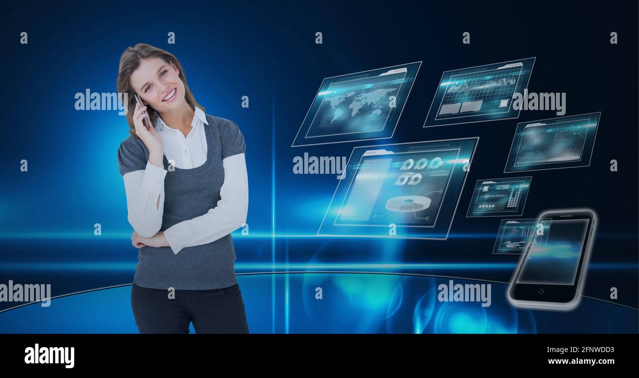 Composition of smiling businesswoman using smartphone over digital screens with data processing Stock Photo