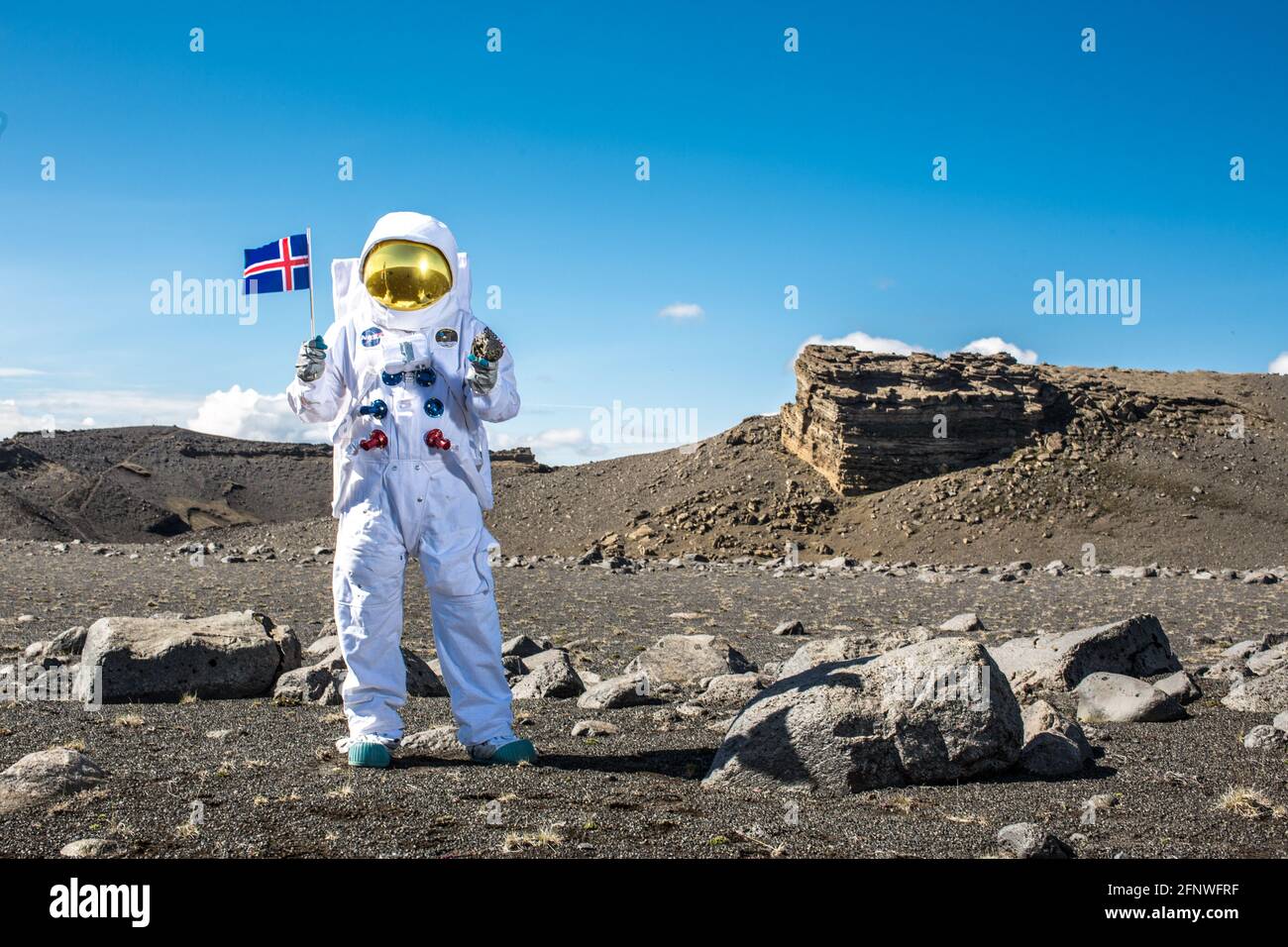 Astronaut in moonscape, Iceland Stock Photo