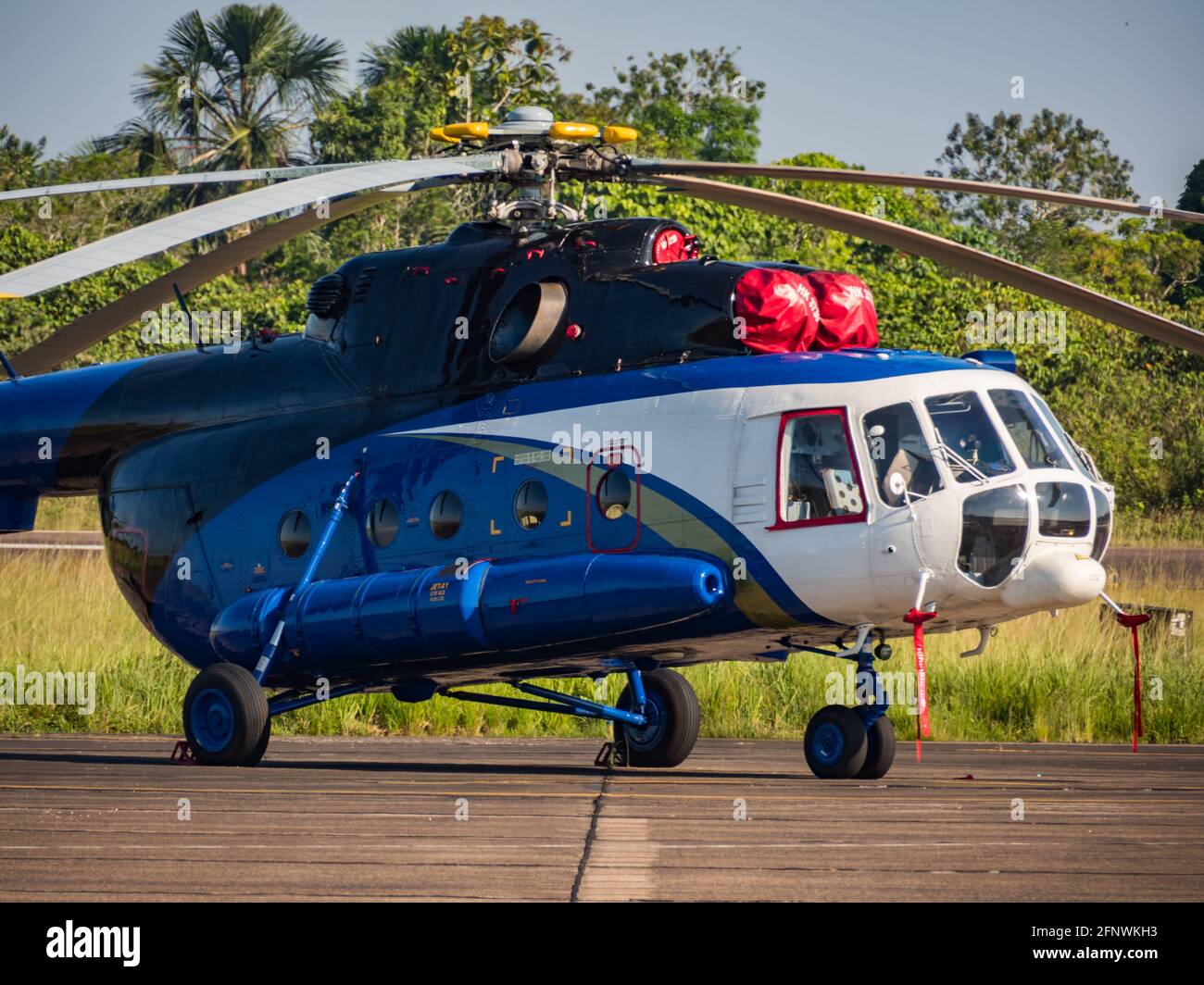 Iquitos, Peru - September 2017: Blue helicopter at Iquitos airport, in the  Amazon jungle, Amazonia, Peru, Latin America Stock Photo - Alamy