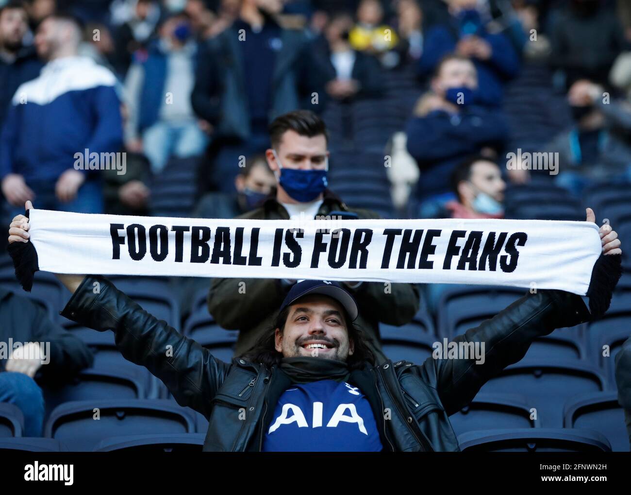 Returning Tottenham Hotspur fans in the stands show their support during the Premier League match at the Tottenham Hotspur Stadium, London. Picture date: Wednesday May 19, 2021. Stock Photo