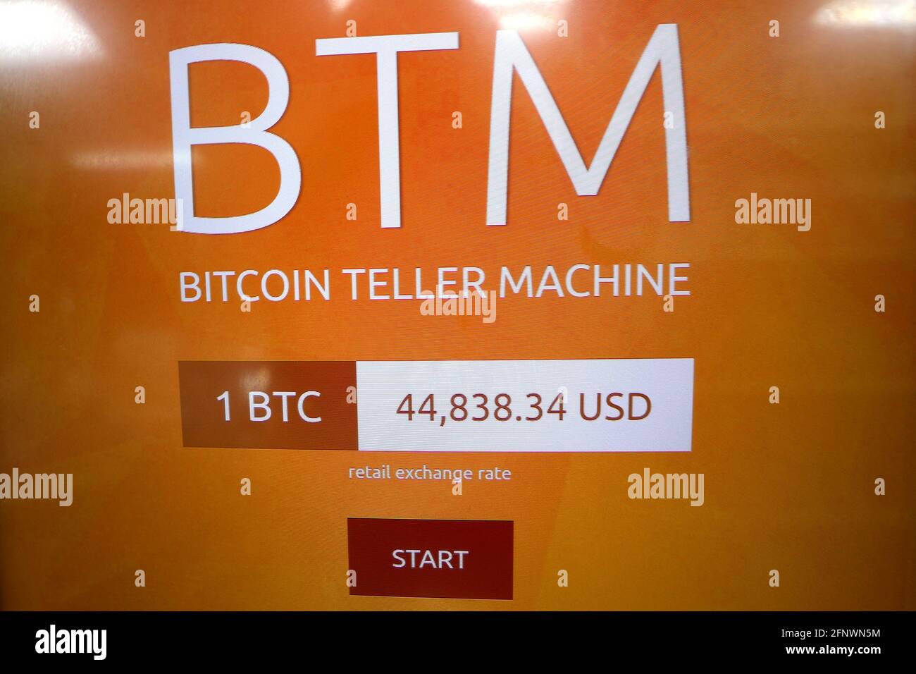 A BTM Bitcoin Teller Machine ATM displays the Bitcoin (BTC) price in a shop  in Union City, New Jersey, U.S., May 19, 2021. REUTERS/Mike Segar Stock  Photo - Alamy
