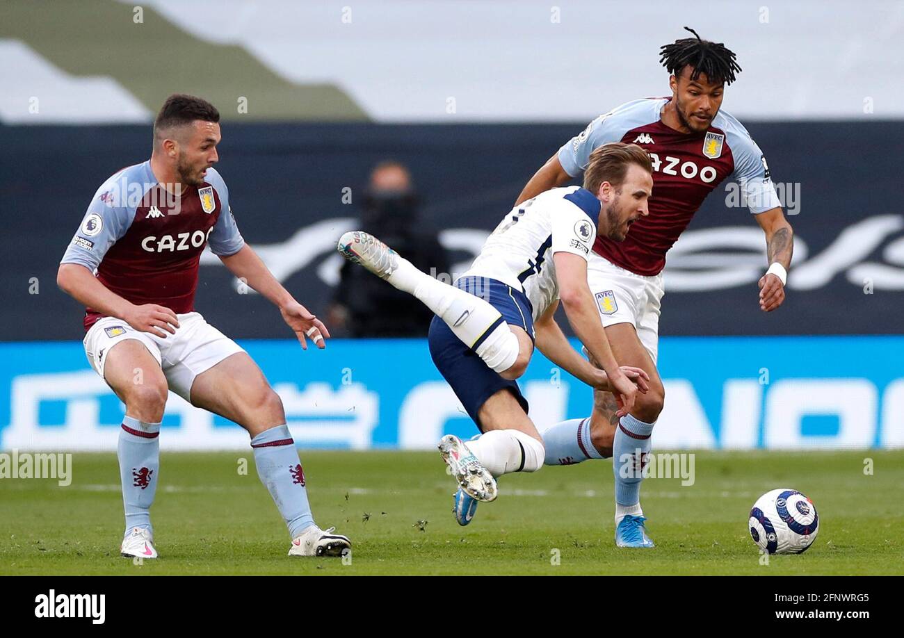 Aston Villa's John McGinn fouls Tottenham Hotspur's Harry Kane during the Premier League match at the Tottenham Hotspur Stadium, London. Picture date: Wednesday May 19, 2021. Stock Photo