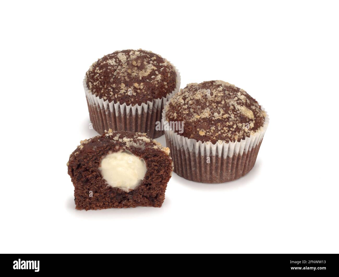 Two chocolate muffins and a half on white Stock Photo