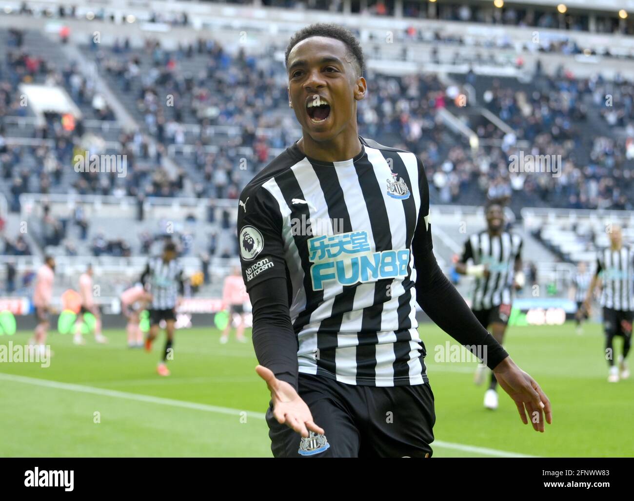 Newcastle United's Joe Willock celebrates scoring their side's first goal of the game during the Premier League match at St. James' Park, Newcastle upon Tyne. Picture date: Wednesday May 19, 2021. Stock Photo