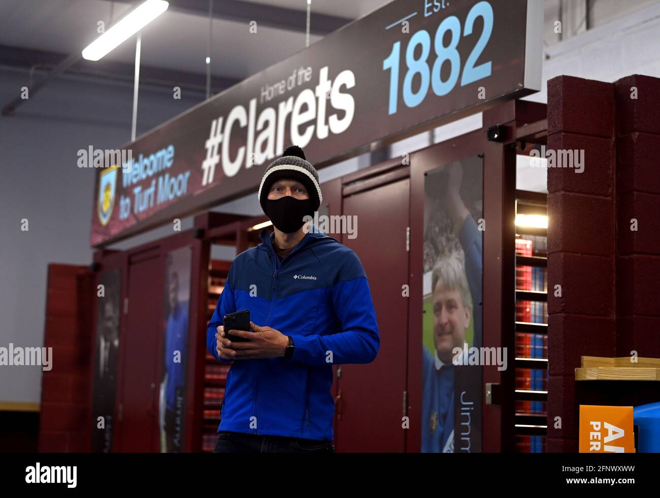 A Burnley fan arrives ahead of the Premier League match at Turf Moor, Burnley. Picture date: Wednesday May 19, 2021. Stock Photo