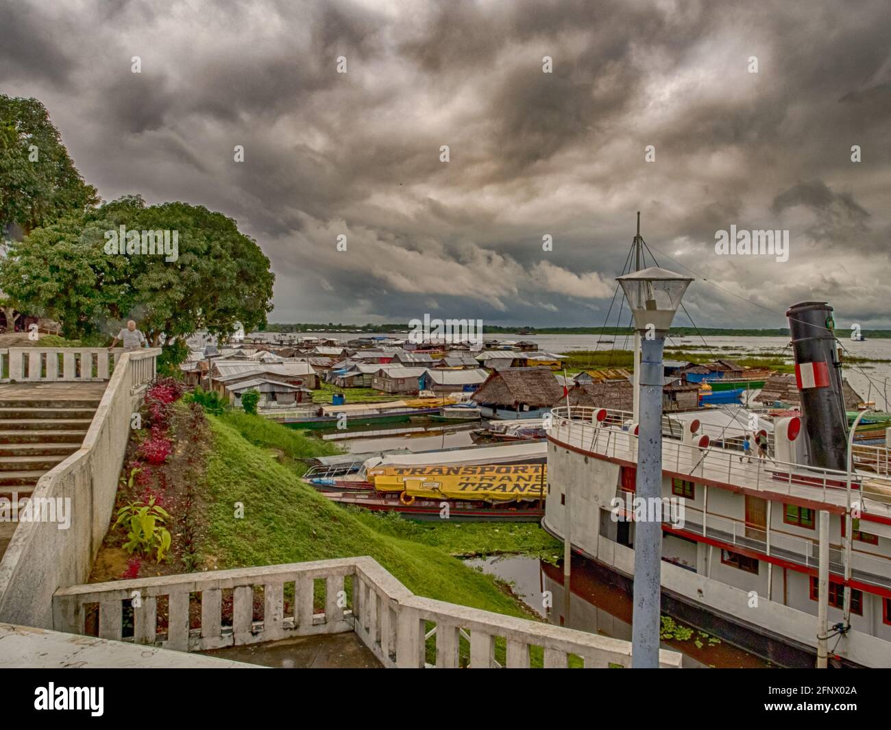 Iquitos, Peru - May 2016: Floating houses on the bank of the Itaya river in Iquitos, Amazon river basin, Amazonia, Peru, South America Stock Photo
